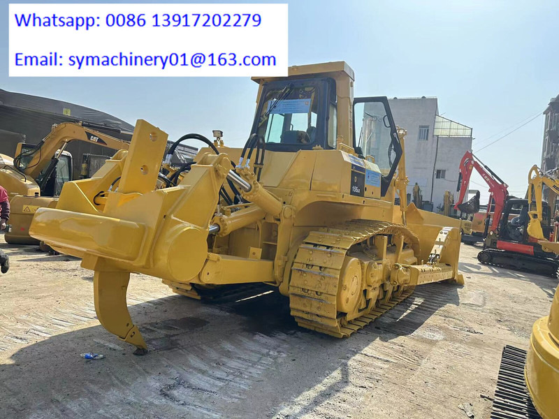 Komatsu D155A-5 - Puskutraktori: kuva Komatsu D155A-5 - Puskutraktori Komatsu D155A-5 - Puskutraktori: kuva Komatsu D155A-5 - Puskutraktori