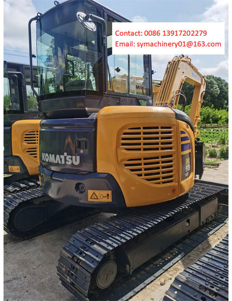 Komatsu PC50 - Minikuormaaja: kuva Komatsu PC50 - Minikuormaaja Komatsu PC50 - Minikuormaaja: kuva Komatsu PC50 - Minikuormaaja