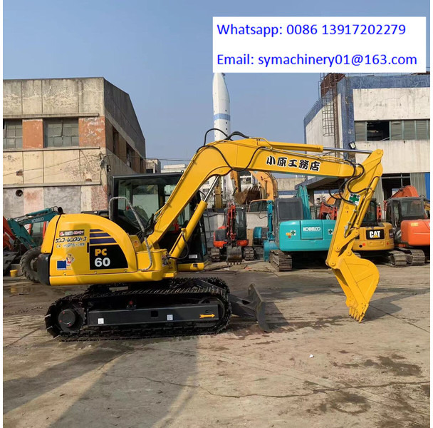 Komatsu PC60-8 - Minikuormaaja: kuva Komatsu PC60-8 - Minikuormaaja Komatsu PC60-8 - Minikuormaaja: kuva Komatsu PC60-8 - Minikuormaaja