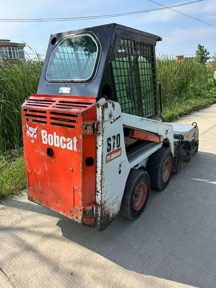 BOBCAT S70 Sliding Sweeper Click for Discount - Liukuohjattu kuormaaja: kuva BOBCAT S70 Sliding Sweeper Click for Discount - Liukuohjattu kuormaaja BOBCAT S70 Sliding Sweeper Click for Discount - Liukuohjattu kuormaaja: kuva BOBCAT S70 Sliding Sweeper Click for Discount - Liukuohjattu kuormaaja