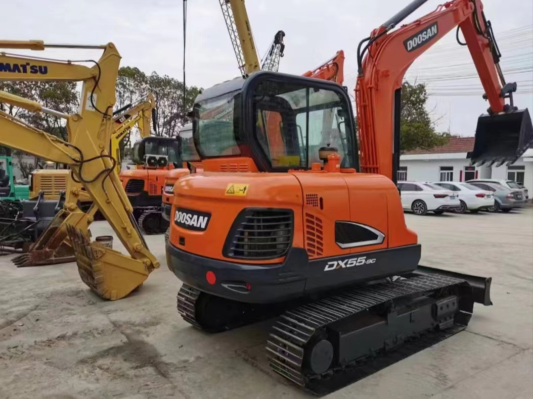 DOOSAN DX 55 Mini excavator - Minikuormaaja: kuva DOOSAN DX 55 Mini excavator - Minikuormaaja DOOSAN DX 55 Mini excavator - Minikuormaaja: kuva DOOSAN DX 55 Mini excavator - Minikuormaaja