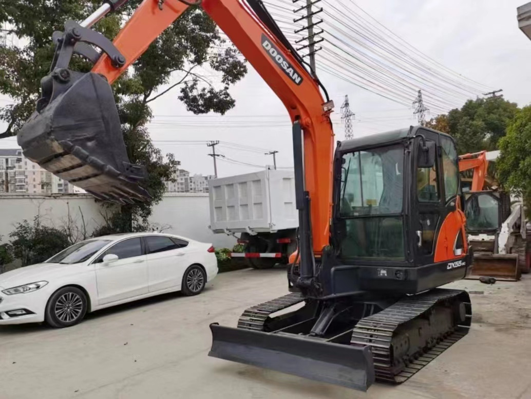 DOOSAN DX 55 Mini excavator - Minikuormaaja: kuva DOOSAN DX 55 Mini excavator - Minikuormaaja DOOSAN DX 55 Mini excavator - Minikuormaaja: kuva DOOSAN DX 55 Mini excavator - Minikuormaaja