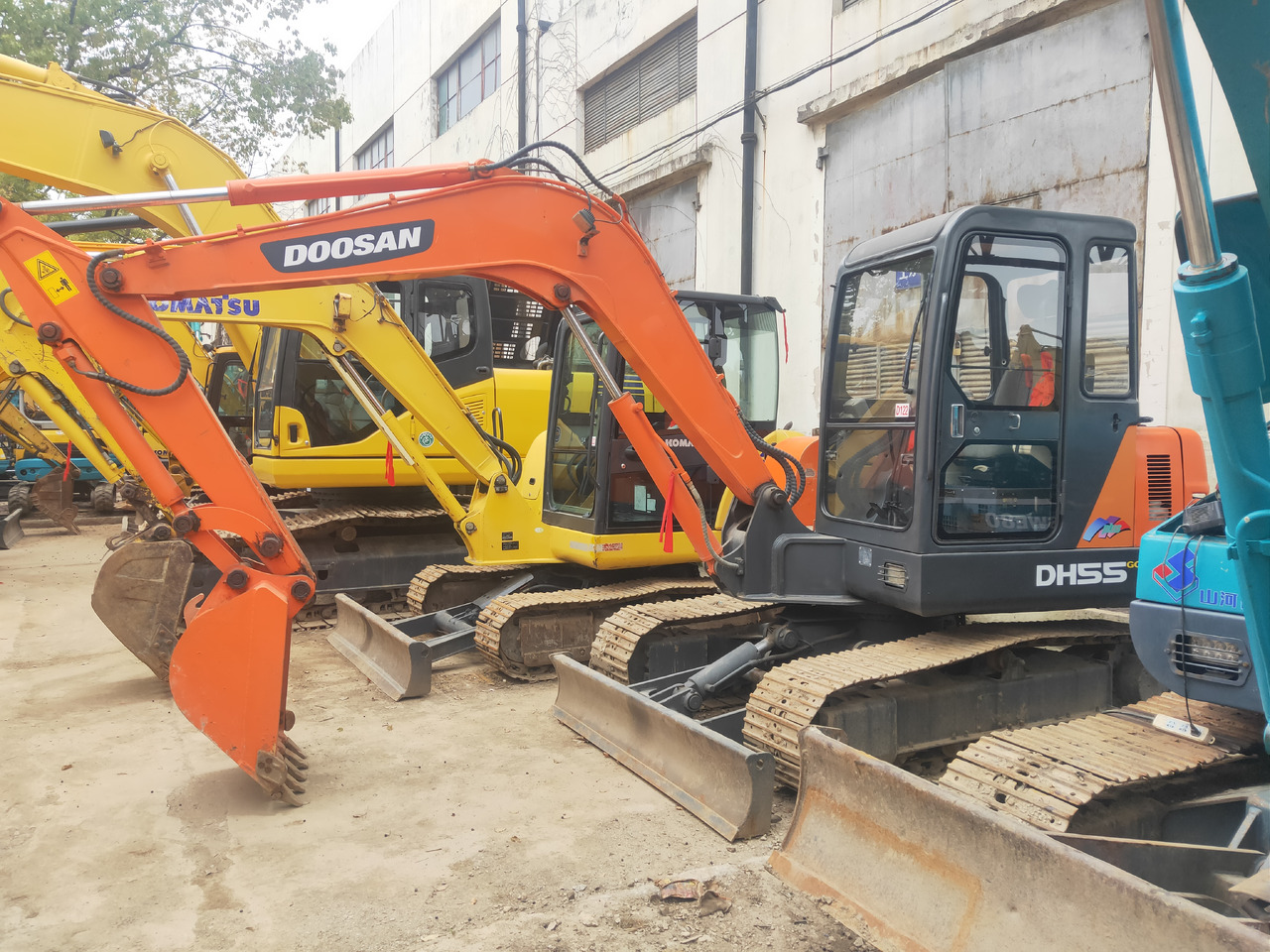DOOSAN Mini Excavator DH5550 - Minikuormaaja: kuva DOOSAN Mini Excavator DH5550 - Minikuormaaja DOOSAN Mini Excavator DH5550 - Minikuormaaja: kuva DOOSAN Mini Excavator DH5550 - Minikuormaaja
