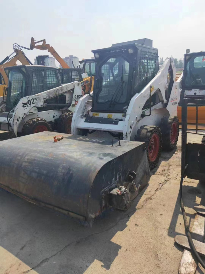 BOBCAT Skid Steer Loader S18 - Rakennuskoneet: kuva BOBCAT Skid Steer Loader S18 - Rakennuskoneet BOBCAT Skid Steer Loader S18 - Rakennuskoneet: kuva BOBCAT Skid Steer Loader S18 - Rakennuskoneet