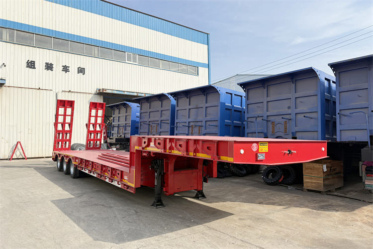 TITAN 100t Lowbed Trailer for Sale in Tanzania - Apuvaunu puoliperävaunu: kuva TITAN 100t Lowbed Trailer for Sale in Tanzania - Apuvaunu puoliperävaunu TITAN 100t Lowbed Trailer for Sale in Tanzania - Apuvaunu puoliperävaunu: kuva TITAN 100t Lowbed Trailer for Sale in Tanzania - Apuvaunu puoliperävaunu