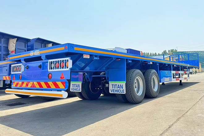 TITAN 2 Axle 45 Ft Flatbed Trailers for Sale in Algeria - Lavapuoliperävaunu: kuva TITAN 2 Axle 45 Ft Flatbed Trailers for Sale in Algeria - Lavapuoliperävaunu TITAN 2 Axle 45 Ft Flatbed Trailers for Sale in Algeria - Lavapuoliperävaunu: kuva TITAN 2 Axle 45 Ft Flatbed Trailers for Sale in Algeria - Lavapuoliperävaunu