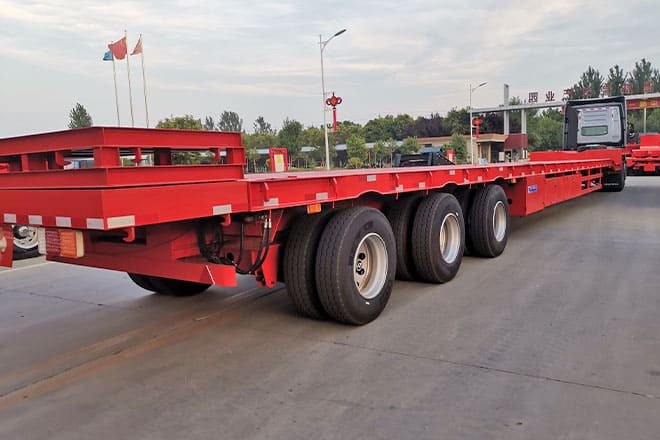 TITAN 3 Axle Extendable Drop Deck Trailers for Sale in Vietnam - Apuvaunu puoliperävaunu: kuva TITAN 3 Axle Extendable Drop Deck Trailers for Sale in Vietnam - Apuvaunu puoliperävaunu TITAN 3 Axle Extendable Drop Deck Trailers for Sale in Vietnam - Apuvaunu puoliperävaunu: kuva TITAN 3 Axle Extendable Drop Deck Trailers for Sale in Vietnam - Apuvaunu puoliperävaunu