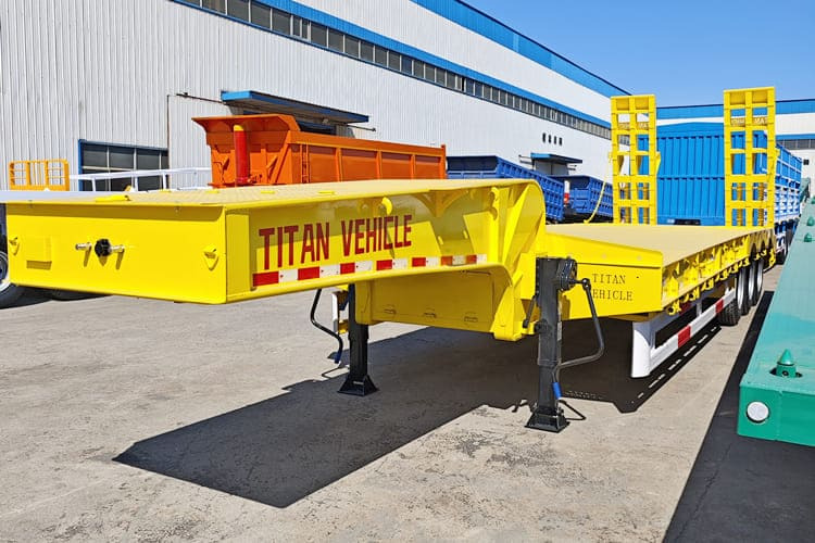 TITAN 3 Axle Low Bed Trailer Price for Sale in Kenya - Apuvaunu puoliperävaunu: kuva TITAN 3 Axle Low Bed Trailer Price for Sale in Kenya - Apuvaunu puoliperävaunu TITAN 3 Axle Low Bed Trailer Price for Sale in Kenya - Apuvaunu puoliperävaunu: kuva TITAN 3 Axle Low Bed Trailer Price for Sale in Kenya - Apuvaunu puoliperävaunu