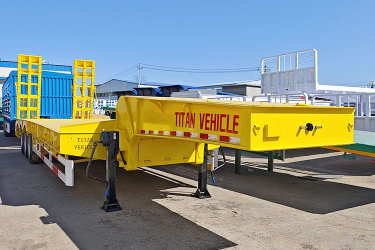 TITAN 3 Axle Low Bed Trailer Price for Sale in Kenya - Apuvaunu puoliperävaunu: kuva TITAN 3 Axle Low Bed Trailer Price for Sale in Kenya - Apuvaunu puoliperävaunu TITAN 3 Axle Low Bed Trailer Price for Sale in Kenya - Apuvaunu puoliperävaunu: kuva TITAN 3 Axle Low Bed Trailer Price for Sale in Kenya - Apuvaunu puoliperävaunu