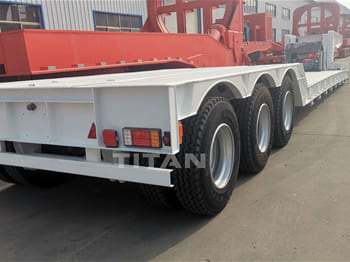 TITAN 3 Axle Lowboy Trailer for Sale in Ghana - Apuvaunu puoliperävaunu: kuva TITAN 3 Axle Lowboy Trailer for Sale in Ghana - Apuvaunu puoliperävaunu TITAN 3 Axle Lowboy Trailer for Sale in Ghana - Apuvaunu puoliperävaunu: kuva TITAN 3 Axle Lowboy Trailer for Sale in Ghana - Apuvaunu puoliperävaunu