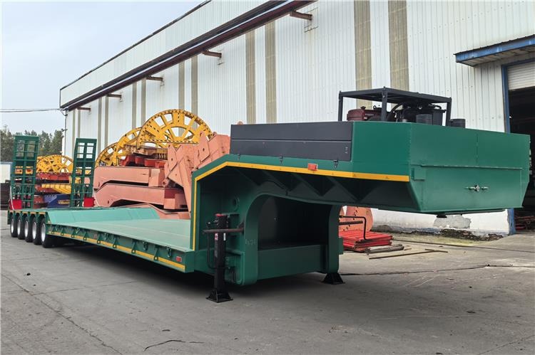 TITAN 5 Axle Low Bed Trailer for Sale In Nigeria - Apuvaunu puoliperävaunu: kuva TITAN 5 Axle Low Bed Trailer for Sale In Nigeria - Apuvaunu puoliperävaunu TITAN 5 Axle Low Bed Trailer for Sale In Nigeria - Apuvaunu puoliperävaunu: kuva TITAN 5 Axle Low Bed Trailer for Sale In Nigeria - Apuvaunu puoliperävaunu