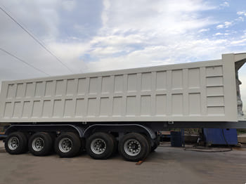 TITAN 5 Axle Tractor Tipper Trailer for Sale in Malawi - Kippiauto puoliperävaunu: kuva TITAN 5 Axle Tractor Tipper Trailer for Sale in Malawi - Kippiauto puoliperävaunu TITAN 5 Axle Tractor Tipper Trailer for Sale in Malawi - Kippiauto puoliperävaunu: kuva TITAN 5 Axle Tractor Tipper Trailer for Sale in Malawi - Kippiauto puoliperävaunu