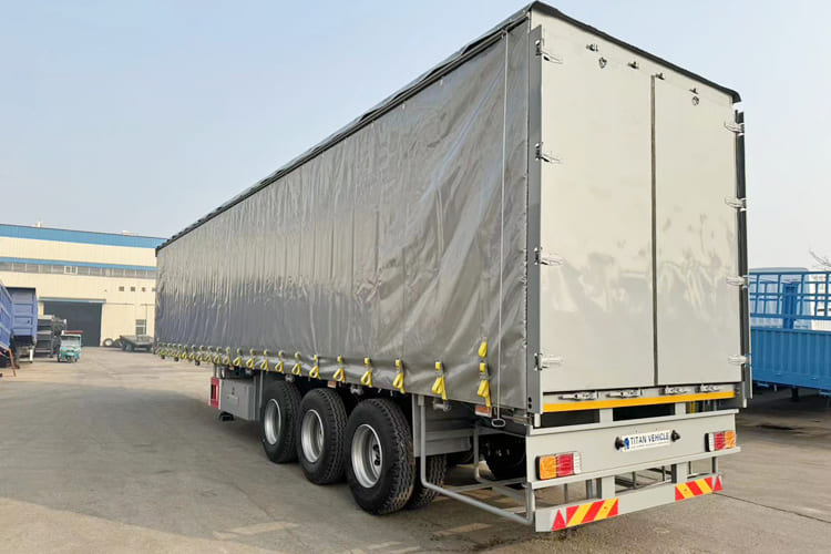 TITAN Curtain Trailer for Sale in Tanzania - Pressukapellipuoliperävaunu: kuva TITAN Curtain Trailer for Sale in Tanzania - Pressukapellipuoliperävaunu TITAN Curtain Trailer for Sale in Tanzania - Pressukapellipuoliperävaunu: kuva TITAN Curtain Trailer for Sale in Tanzania - Pressukapellipuoliperävaunu