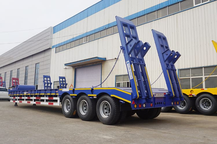 TITAN Tri Axle Low Loader Trailer for Sale in Mali - Apuvaunu puoliperävaunu: kuva TITAN Tri Axle Low Loader Trailer for Sale in Mali - Apuvaunu puoliperävaunu TITAN Tri Axle Low Loader Trailer for Sale in Mali - Apuvaunu puoliperävaunu: kuva TITAN Tri Axle Low Loader Trailer for Sale in Mali - Apuvaunu puoliperävaunu