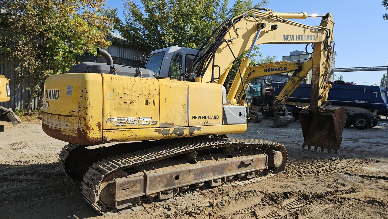 Telakaivukone NEW HOLLAND E 245 B: kuva Telakaivukone NEW HOLLAND E 245 B Telakaivukone NEW HOLLAND E 245 B: kuva Telakaivukone NEW HOLLAND E 245 B