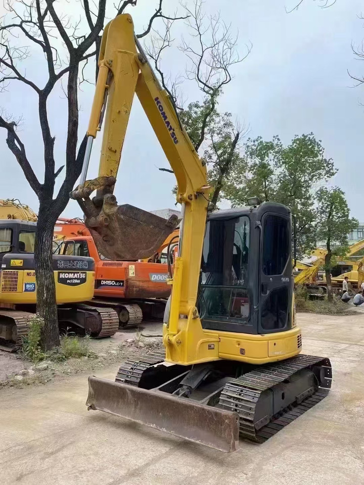 KOMATSU pc55mr mini excavator low price for sale - Minikuormaaja: kuva KOMATSU pc55mr mini excavator low price for sale - Minikuormaaja KOMATSU pc55mr mini excavator low price for sale - Minikuormaaja: kuva KOMATSU pc55mr mini excavator low price for sale - Minikuormaaja