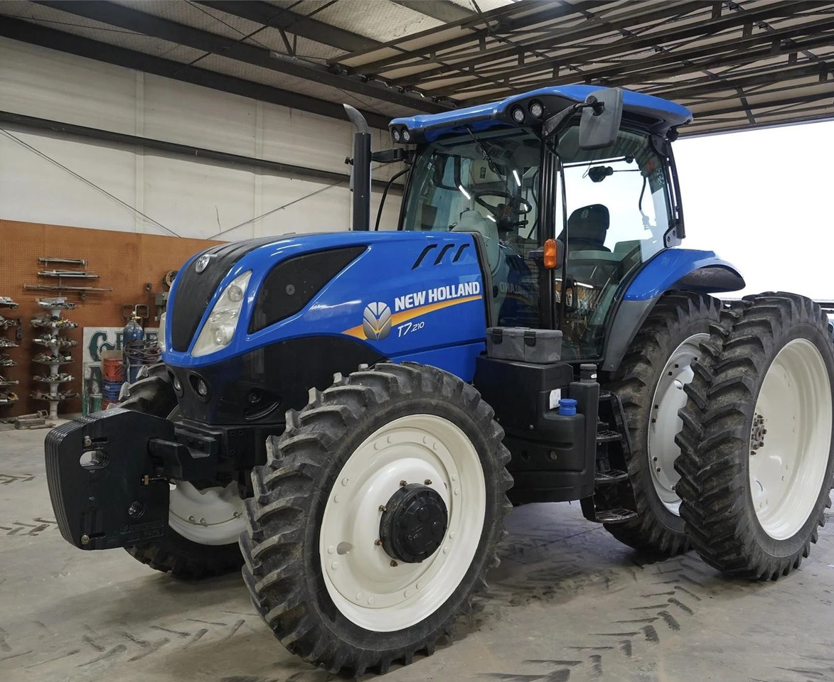 NEW HOLLAND T7.210 - Traktori: kuva NEW HOLLAND T7.210 - Traktori NEW HOLLAND T7.210 - Traktori: kuva NEW HOLLAND T7.210 - Traktori