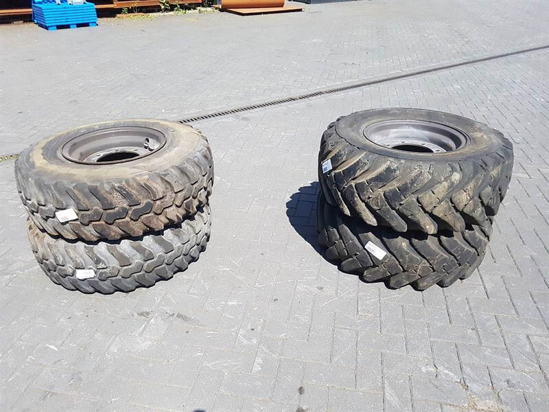 Ahlmann AS50-Solideal 12.5-18-Dunlop 12.5R18-Tire/Reifen - Renkaat ja vanteet - Rakennuskoneet: kuva Ahlmann AS50-Solideal 12.5-18-Dunlop 12.5R18-Tire/Reifen - Renkaat ja vanteet - Rakennuskoneet Ahlmann AS50-Solideal 12.5-18-Dunlop 12.5R18-Tire/Reifen - Renkaat ja vanteet - Rakennuskoneet: kuva Ahlmann AS50-Solideal 12.5-18-Dunlop 12.5R18-Tire/Reifen - Renkaat ja vanteet - Rakennuskoneet