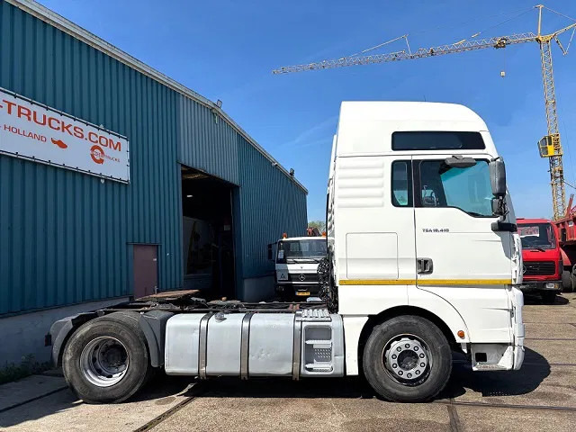 MAN TGA 18.410 FLS XXL (6-CILINDER HEADS / ZF16 MANUAL GEARBOX / ZF-INTARDER / HYDRAULIC KIT / P.T.O. / AIRCONDITIONING) - Vetopöytäauto: kuva MAN TGA 18.410 FLS XXL (6-CILINDER HEADS / ZF16 MANUAL GEARBOX / ZF-INTARDER / HYDRAULIC KIT / P.T.O. / AIRCONDITIONING) - Vetopöytäauto MAN TGA 18.410 FLS XXL (6-CILINDER HEADS / ZF16 MANUAL GEARBOX / ZF-INTARDER / HYDRAULIC KIT / P.T.O. / AIRCONDITIONING) - Vetopöytäauto: kuva MAN TGA 18.410 FLS XXL (6-CILINDER HEADS / ZF16 MANUAL GEARBOX / ZF-INTARDER / HYDRAULIC KIT / P.T.O. / AIRCONDITIONING) - Vetopöytäauto