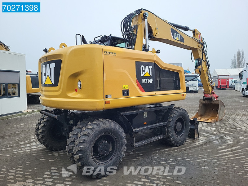 Caterpillar M314 F - Pyöräalustainen kaivinkone: kuva Caterpillar M314 F - Pyöräalustainen kaivinkone Caterpillar M314 F - Pyöräalustainen kaivinkone: kuva Caterpillar M314 F - Pyöräalustainen kaivinkone