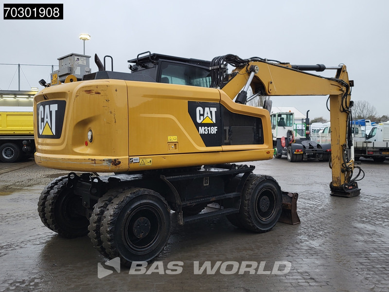 Caterpillar M318 F - Pyöräalustainen kaivinkone: kuva Caterpillar M318 F - Pyöräalustainen kaivinkone Caterpillar M318 F - Pyöräalustainen kaivinkone: kuva Caterpillar M318 F - Pyöräalustainen kaivinkone