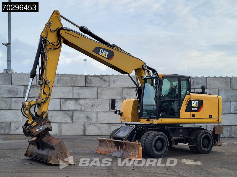 Caterpillar M320 F - Pyöräalustainen kaivinkone: kuva Caterpillar M320 F - Pyöräalustainen kaivinkone Caterpillar M320 F - Pyöräalustainen kaivinkone: kuva Caterpillar M320 F - Pyöräalustainen kaivinkone