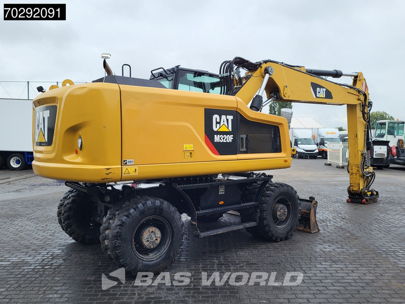 Caterpillar M320 F - Pyöräalustainen kaivinkone: kuva Caterpillar M320 F - Pyöräalustainen kaivinkone Caterpillar M320 F - Pyöräalustainen kaivinkone: kuva Caterpillar M320 F - Pyöräalustainen kaivinkone