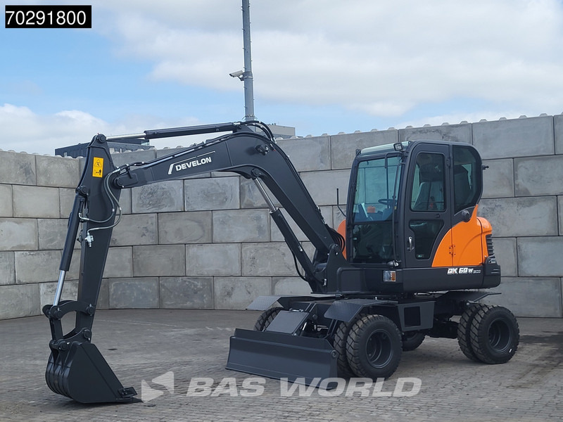 Develon DX60 WN ECO-1 A/C - Pyöräalustainen kaivinkone: kuva Develon DX60 WN ECO-1 A/C - Pyöräalustainen kaivinkone Develon DX60 WN ECO-1 A/C - Pyöräalustainen kaivinkone: kuva Develon DX60 WN ECO-1 A/C - Pyöräalustainen kaivinkone