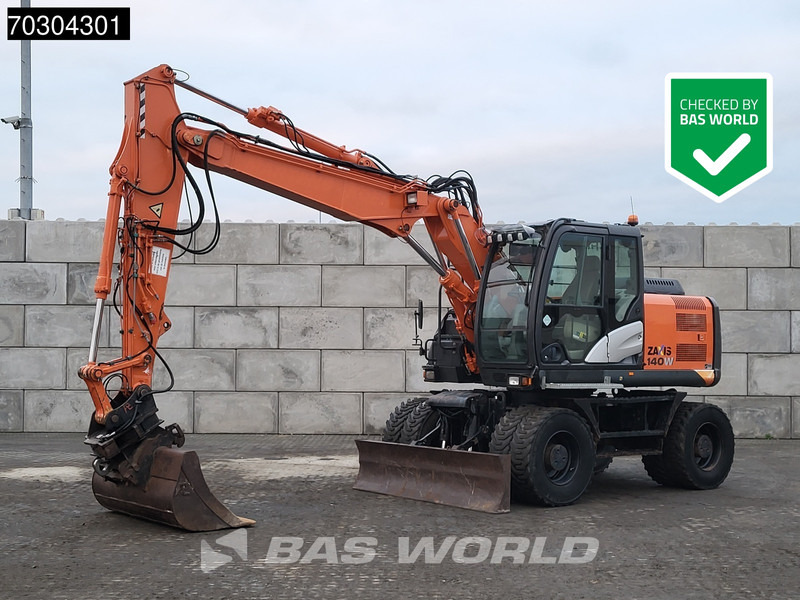 Hitachi ZX140W -5 - Pyöräalustainen kaivinkone: kuva Hitachi ZX140W -5 - Pyöräalustainen kaivinkone Hitachi ZX140W -5 - Pyöräalustainen kaivinkone: kuva Hitachi ZX140W -5 - Pyöräalustainen kaivinkone