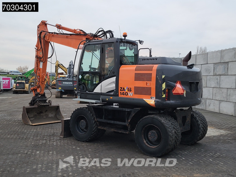 Hitachi ZX140W -5 - Pyöräalustainen kaivinkone: kuva Hitachi ZX140W -5 - Pyöräalustainen kaivinkone Hitachi ZX140W -5 - Pyöräalustainen kaivinkone: kuva Hitachi ZX140W -5 - Pyöräalustainen kaivinkone