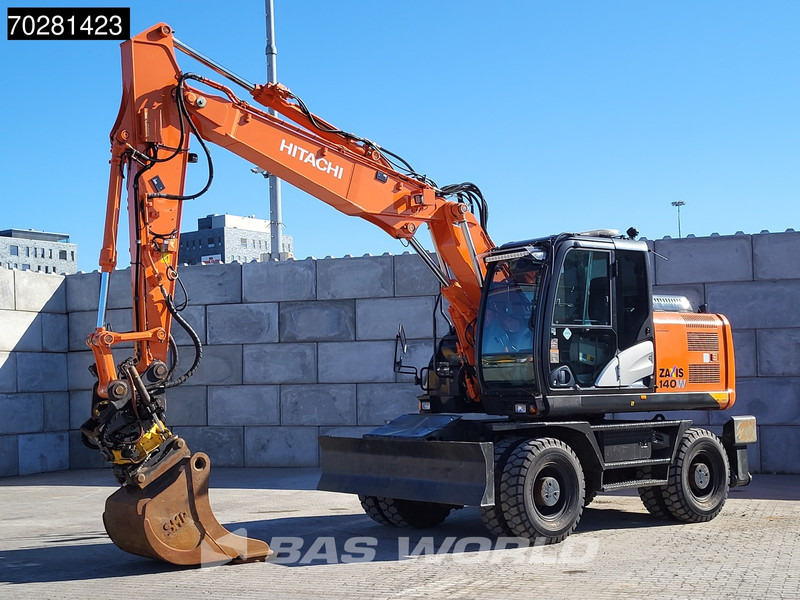 Hitachi ZX140W -5 OUTRIGGERS + BLADE - Pyöräalustainen kaivinkone: kuva Hitachi ZX140W -5 OUTRIGGERS + BLADE - Pyöräalustainen kaivinkone Hitachi ZX140W -5 OUTRIGGERS + BLADE - Pyöräalustainen kaivinkone: kuva Hitachi ZX140W -5 OUTRIGGERS + BLADE - Pyöräalustainen kaivinkone