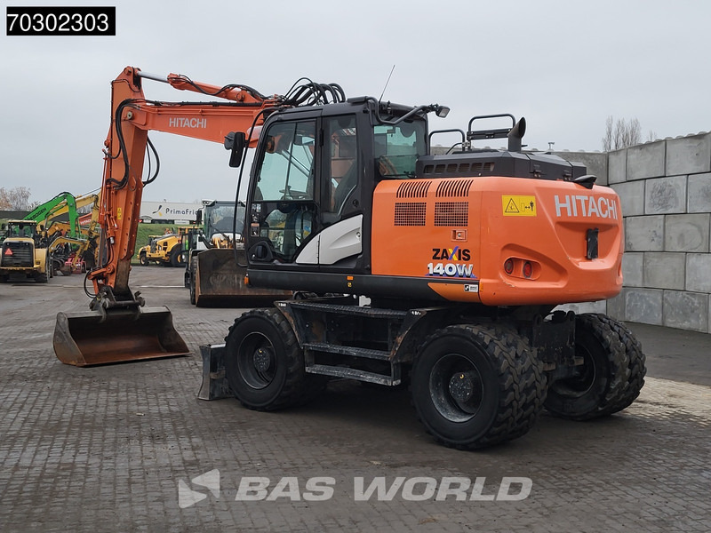 Hitachi ZX140W -6 - Pyöräalustainen kaivinkone: kuva Hitachi ZX140W -6 - Pyöräalustainen kaivinkone Hitachi ZX140W -6 - Pyöräalustainen kaivinkone: kuva Hitachi ZX140W -6 - Pyöräalustainen kaivinkone