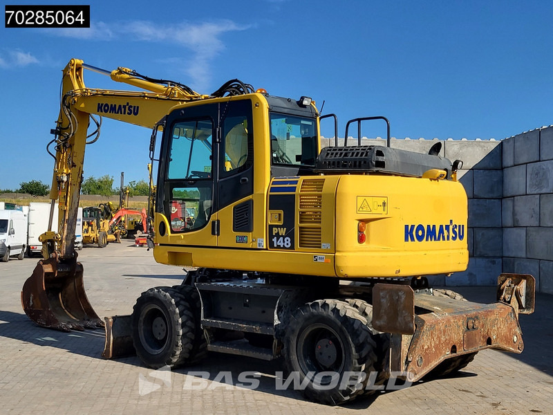 Komatsu PW148 -8 - Pyöräalustainen kaivinkone: kuva Komatsu PW148 -8 - Pyöräalustainen kaivinkone Komatsu PW148 -8 - Pyöräalustainen kaivinkone: kuva Komatsu PW148 -8 - Pyöräalustainen kaivinkone