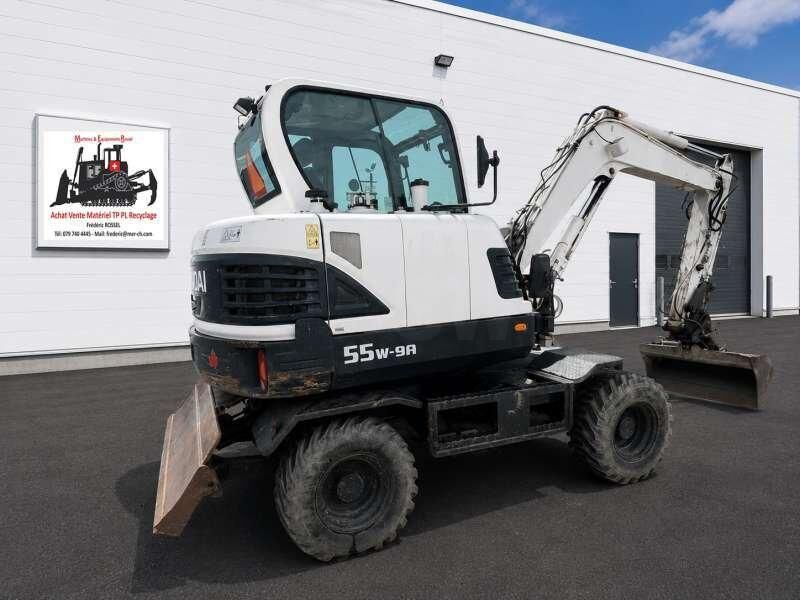 Hyundai ROBEX55W-9A - Pyöräalustainen kaivinkone: kuva Hyundai ROBEX55W-9A - Pyöräalustainen kaivinkone Hyundai ROBEX55W-9A - Pyöräalustainen kaivinkone: kuva Hyundai ROBEX55W-9A - Pyöräalustainen kaivinkone