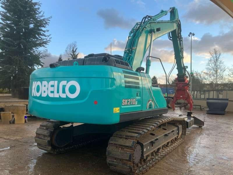 Kobelco SK210LC-10E - Materiaalinkäsittelykone: kuva Kobelco SK210LC-10E - Materiaalinkäsittelykone Kobelco SK210LC-10E - Materiaalinkäsittelykone: kuva Kobelco SK210LC-10E - Materiaalinkäsittelykone