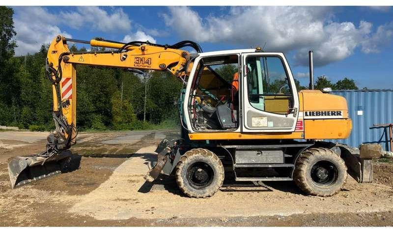 Liebherr A314 Litronic - Pyöräalustainen kaivinkone: kuva Liebherr A314 Litronic - Pyöräalustainen kaivinkone Liebherr A314 Litronic - Pyöräalustainen kaivinkone: kuva Liebherr A314 Litronic - Pyöräalustainen kaivinkone