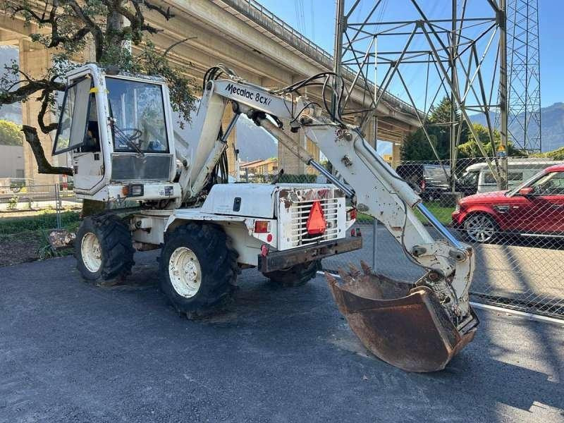 Mecalac 8CXI - Pyöräalustainen kaivinkone: kuva Mecalac 8CXI - Pyöräalustainen kaivinkone Mecalac 8CXI - Pyöräalustainen kaivinkone: kuva Mecalac 8CXI - Pyöräalustainen kaivinkone