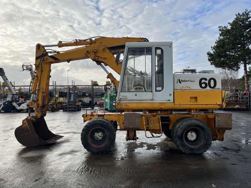 Poclain P60 - Pyöräalustainen kaivinkone: kuva Poclain P60 - Pyöräalustainen kaivinkone Poclain P60 - Pyöräalustainen kaivinkone: kuva Poclain P60 - Pyöräalustainen kaivinkone