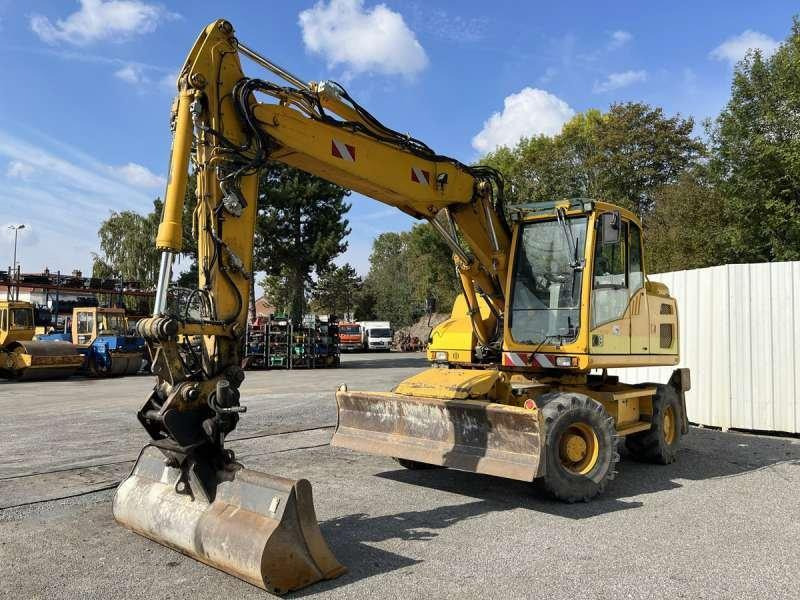 Volvo EW140D - Pyöräalustainen kaivinkone: kuva Volvo EW140D - Pyöräalustainen kaivinkone Volvo EW140D - Pyöräalustainen kaivinkone: kuva Volvo EW140D - Pyöräalustainen kaivinkone