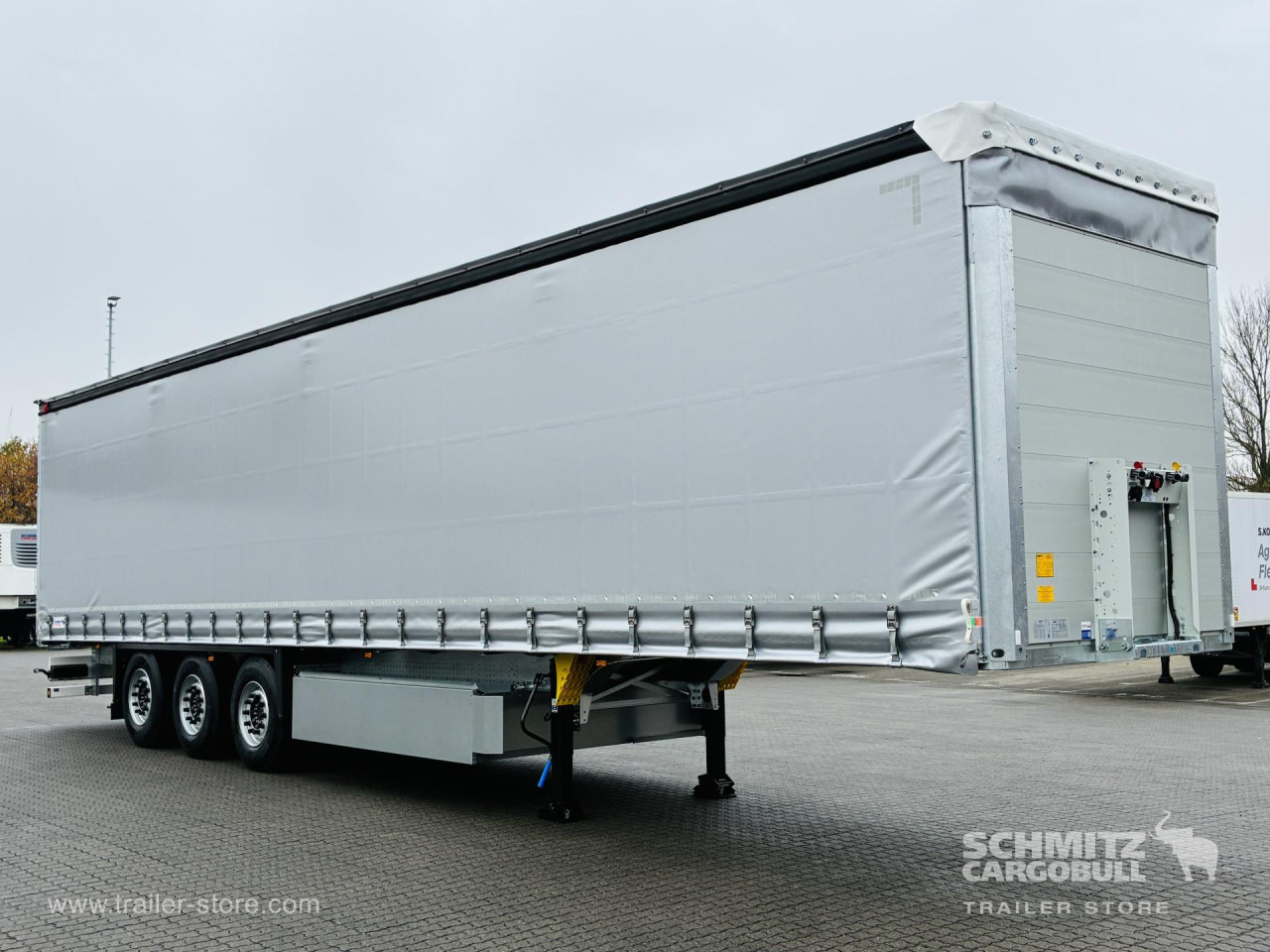 SCHMITZ Auflieger Curtainsider Standard - Pressukapellipuoliperävaunu: kuva SCHMITZ Auflieger Curtainsider Standard - Pressukapellipuoliperävaunu SCHMITZ Auflieger Curtainsider Standard - Pressukapellipuoliperävaunu: kuva SCHMITZ Auflieger Curtainsider Standard - Pressukapellipuoliperävaunu