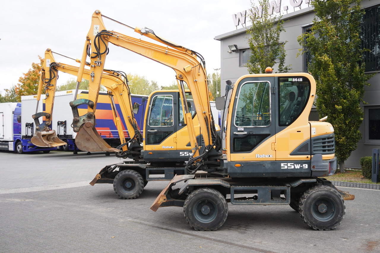 Hyundai Robex 55W-9 Wheeled Excavator 5.5t / 2pcs - Minikuormaaja: kuva Hyundai Robex 55W-9 Wheeled Excavator 5.5t / 2pcs - Minikuormaaja Hyundai Robex 55W-9 Wheeled Excavator 5.5t / 2pcs - Minikuormaaja: kuva Hyundai Robex 55W-9 Wheeled Excavator 5.5t / 2pcs - Minikuormaaja