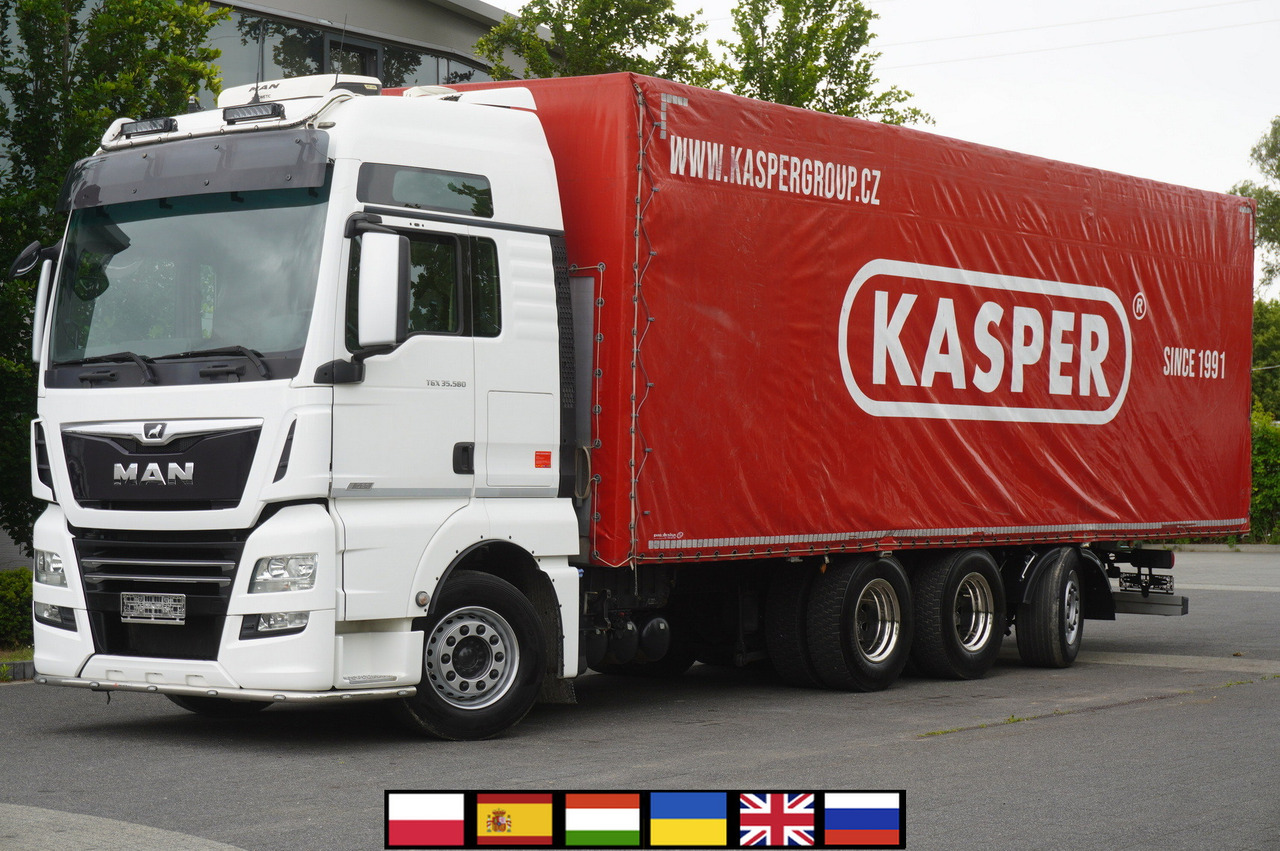MAN TGX 35.580 E6 8x4 /4 / 23 EPAL tarp superstructure / 4th axle steered - Pressukapelli kuorma-auto: kuva MAN TGX 35.580 E6 8x4 /4 / 23 EPAL tarp superstructure / 4th axle steered - Pressukapelli kuorma-auto MAN TGX 35.580 E6 8x4 /4 / 23 EPAL tarp superstructure / 4th axle steered - Pressukapelli kuorma-auto: kuva MAN TGX 35.580 E6 8x4 /4 / 23 EPAL tarp superstructure / 4th axle steered - Pressukapelli kuorma-auto