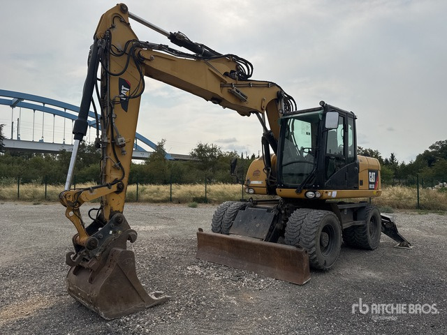 2012 Cat M313D Pelle Sur Pneus Wheel Excavator - Pyöräalustainen kaivinkone: kuva 2012 Cat M313D Pelle Sur Pneus Wheel Excavator - Pyöräalustainen kaivinkone 2012 Cat M313D Pelle Sur Pneus Wheel Excavator - Pyöräalustainen kaivinkone: kuva 2012 Cat M313D Pelle Sur Pneus Wheel Excavator - Pyöräalustainen kaivinkone