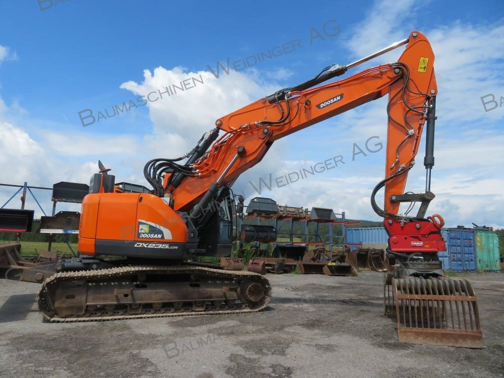 Doosan DX 235 LCR-5 - Telakaivukone: kuva Doosan DX 235 LCR-5 - Telakaivukone Doosan DX 235 LCR-5 - Telakaivukone: kuva Doosan DX 235 LCR-5 - Telakaivukone