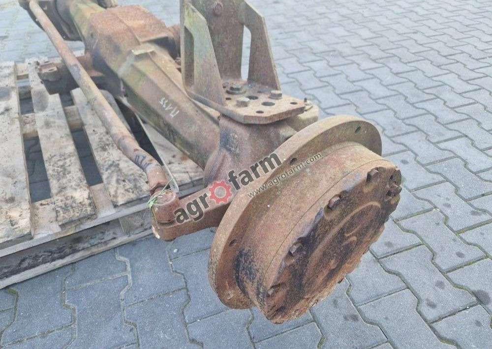 Przedni most Fiat New Holland M135 - Vaihteisto: kuva Przedni most Fiat New Holland M135 - Vaihteisto Przedni most Fiat New Holland M135 - Vaihteisto: kuva Przedni most Fiat New Holland M135 - Vaihteisto