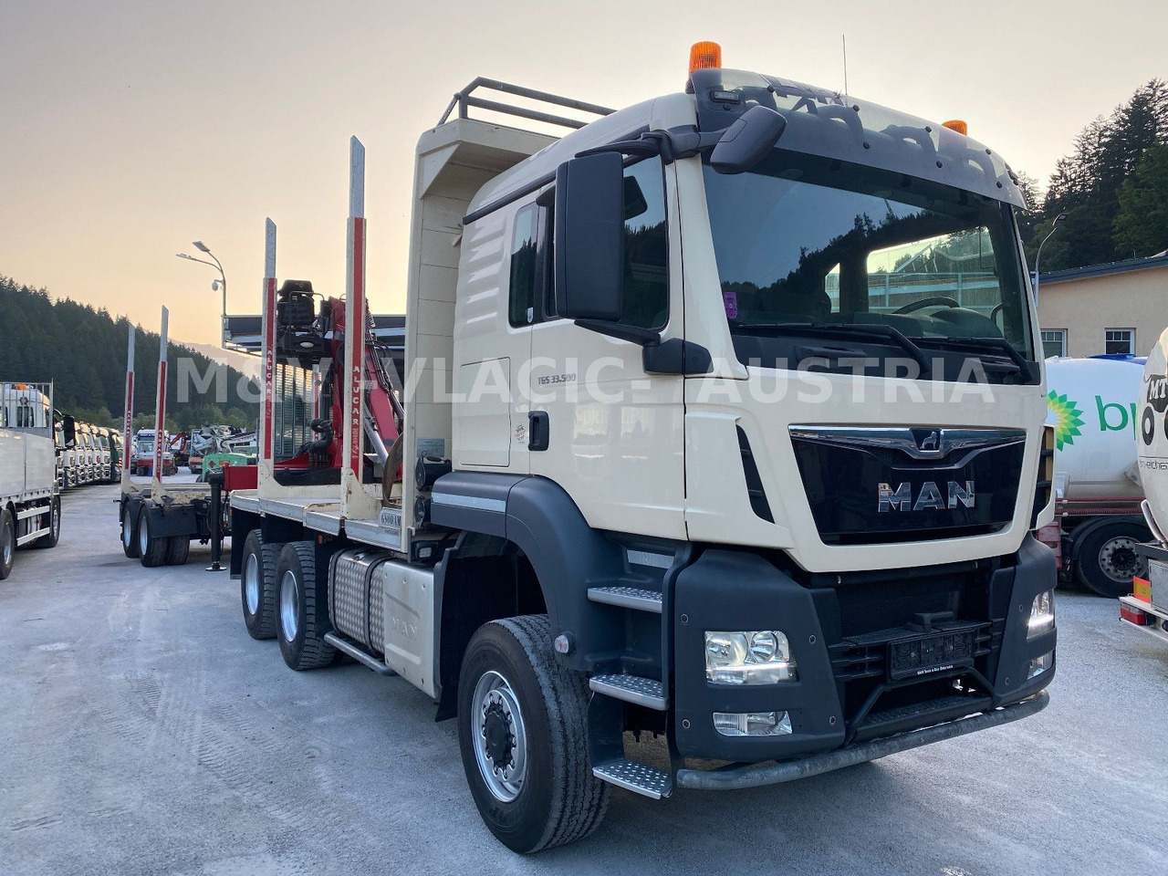 MAN 33.500 6X6 mit Kran PENZ 12Z - Puuauto, Nosturiauto: kuva MAN 33.500 6X6 mit Kran PENZ 12Z - Puuauto, Nosturiauto MAN 33.500 6X6 mit Kran PENZ 12Z - Puuauto, Nosturiauto: kuva MAN 33.500 6X6 mit Kran PENZ 12Z - Puuauto, Nosturiauto