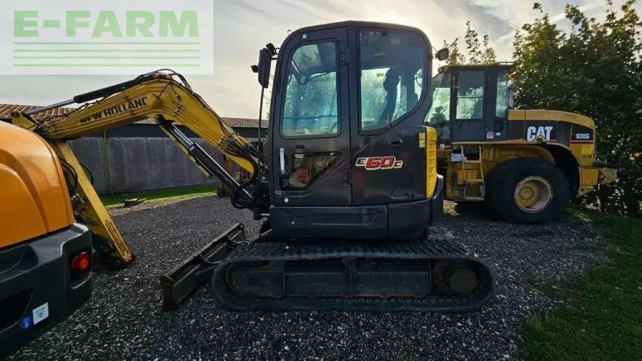 New Holland e60c - Minikuormaaja: kuva New Holland e60c - Minikuormaaja New Holland e60c - Minikuormaaja: kuva New Holland e60c - Minikuormaaja