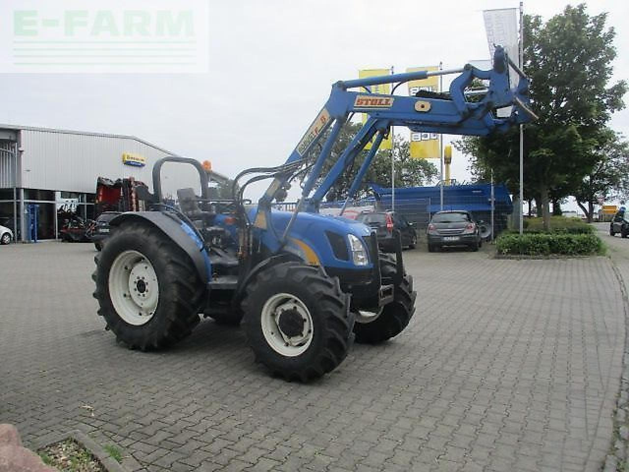 New Holland tn70 a niedrige bauhöhe - Traktori: kuva New Holland tn70 a niedrige bauhöhe - Traktori New Holland tn70 a niedrige bauhöhe - Traktori: kuva New Holland tn70 a niedrige bauhöhe - Traktori