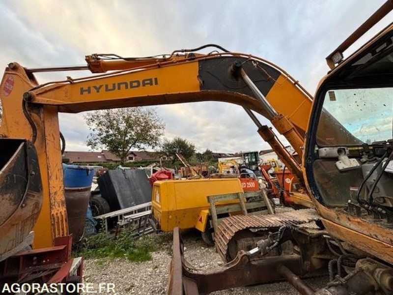 PELLE A CHENILLES HYUNDAI ROBEX 130LCD-3 2000 10083 HEURES - Kaivuri: kuva PELLE A CHENILLES HYUNDAI ROBEX 130LCD-3 2000 10083 HEURES - Kaivuri PELLE A CHENILLES HYUNDAI ROBEX 130LCD-3 2000 10083 HEURES - Kaivuri: kuva PELLE A CHENILLES HYUNDAI ROBEX 130LCD-3 2000 10083 HEURES - Kaivuri