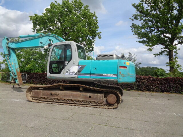 Kobelco SK250NLC - Telakaivukone: kuva Kobelco SK250NLC - Telakaivukone Kobelco SK250NLC - Telakaivukone: kuva Kobelco SK250NLC - Telakaivukone